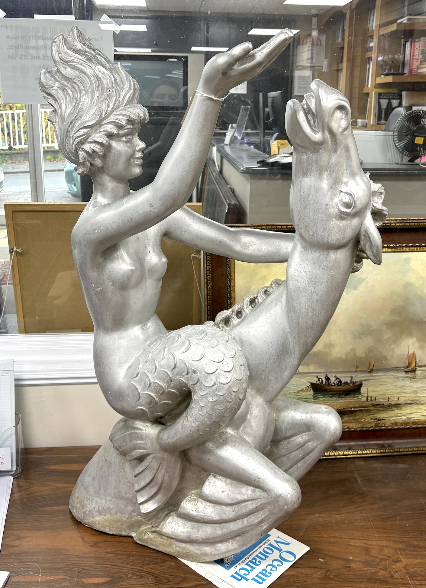 Arthur Fleischmann (1896-1990), an aluminium figure of 'Esther' astride a hippocamp, height 110cm, removed from The Shaw Savill cruise liner 'The Ocean Monarch', with original brochure and invoice